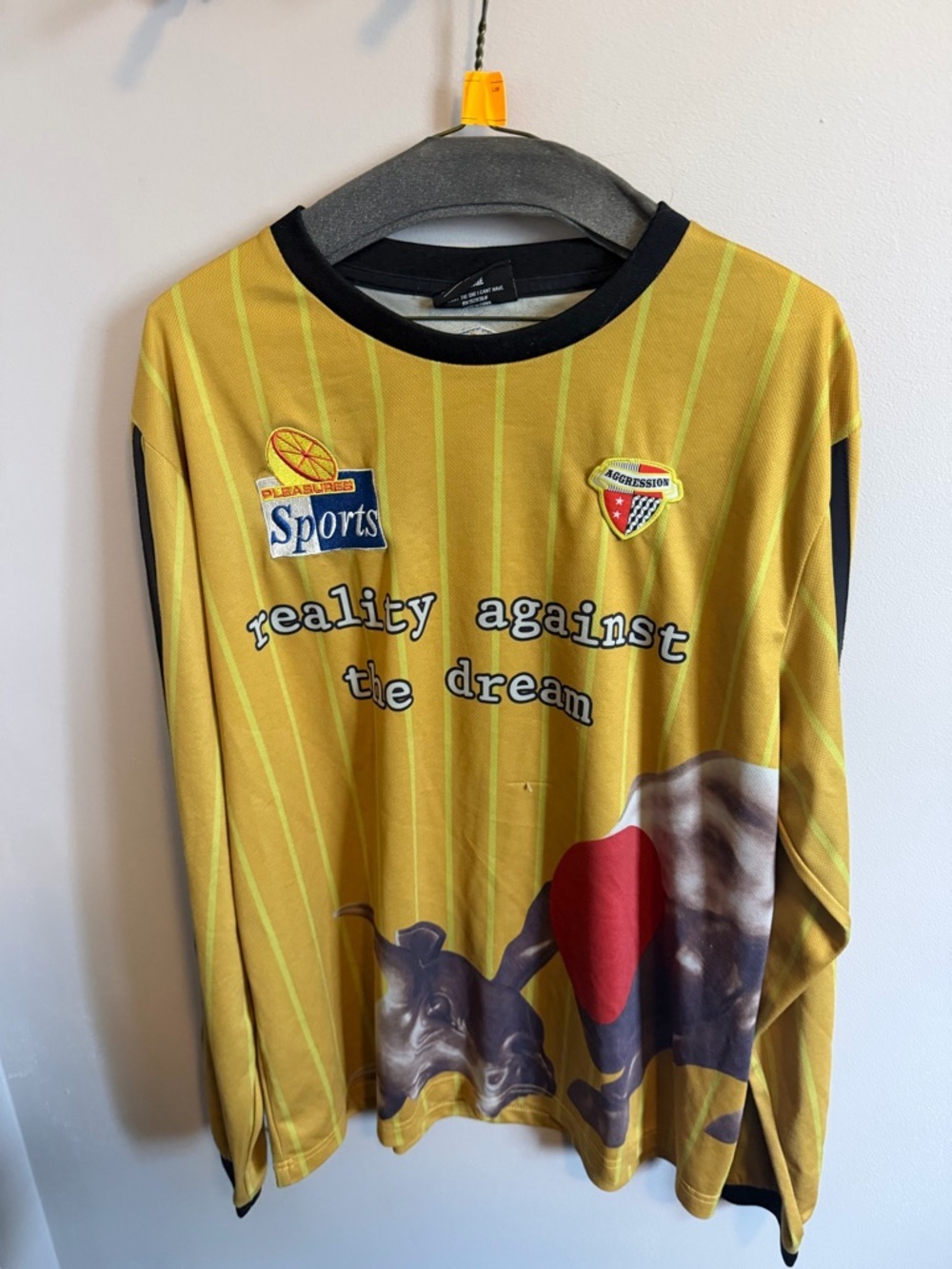 Pleasures Gold Reality Against the Dream Graphic Soccer Jersey Size Large
